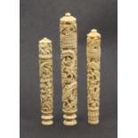 Three 19th Century Cantonese floral and dragon carved ivory needle cases of tapering cylinder