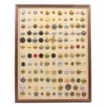 Buttons - a framed display of 100+ including banks, transport, civil defence and related services,