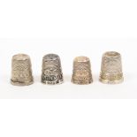 Four British silver thimbles with raised letter borders for towns and cities comprising Llandudno/