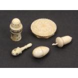 Four 19th Century ivory vinaigrettes and a container comprising a disc form floral example with