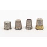 Four attractive continental thimbles, comprising a plain example with inset mother of pearl top, a