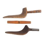 Three 19th Century wooden knitting sticks and sheaths comprising two goose wing examples, one with