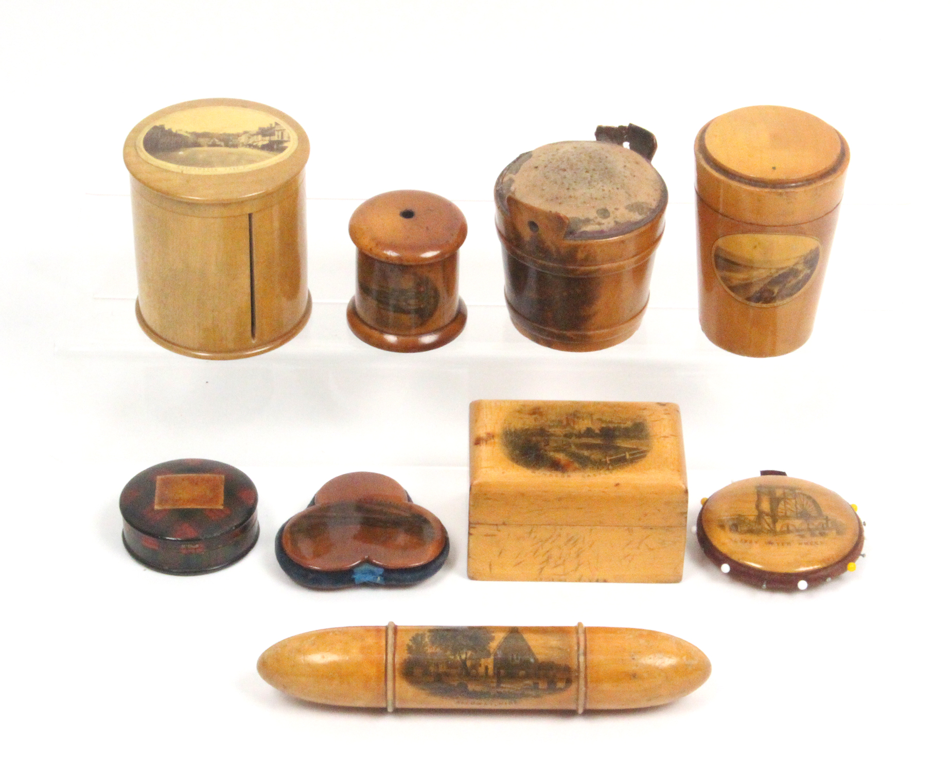 Mauchline ware - nine pieces - comprising a Medlock tape casket (photographic - Okehampton Fore St.)