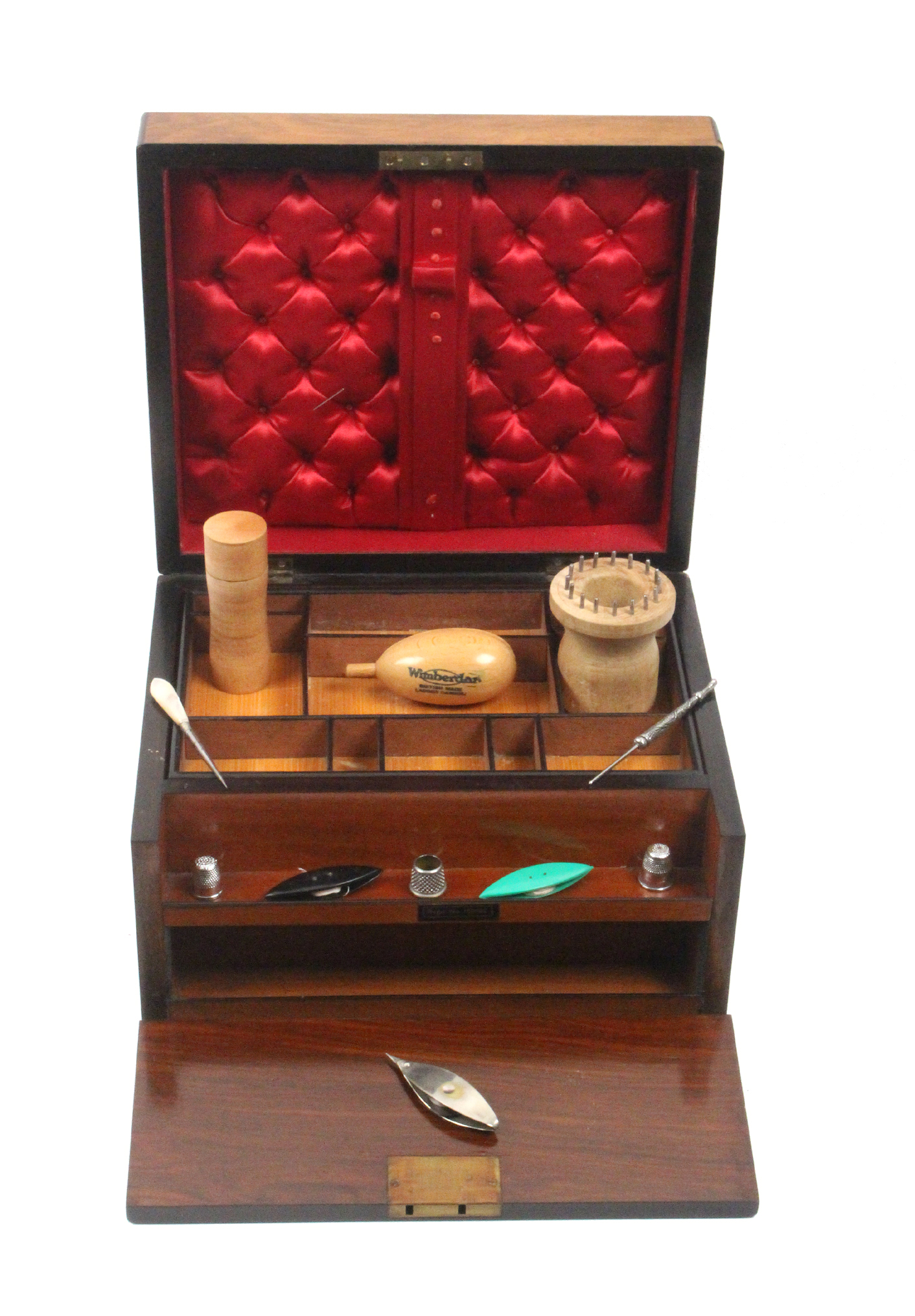 A late Victorian walnut sewing box of rectangular form, hinged fall front with trays for reels,