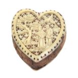 An early 19th Century Cantonese carved and pierced ivory heart shaped pin cushion, each side with