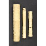 A 19th Century ivory bodkin case and two needle cases, the bodkin case of cylinder form carved