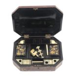 A mid 19th Century Chinese export lacquer sewing box of canted rectangular form, decorated with