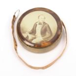 A commemorative tape measure of circular form stamped to the brass sides '3ft Patent', one side with