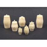 Seven 19th Century ivory cotton barrels comprising a spindle wind pair, 5.4cm high, and five others,
