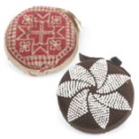 Two late 18th Century/early 19th Century circular pin cushions, one of knitted circular form