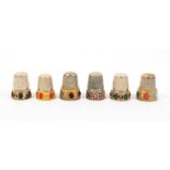 Six continental white metal thimbles all with jewelled borders, four part gilded (6)