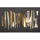 Crochet hooks and ribbon threaders, the crochet hooks including three fancy brass sliders, a brass