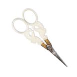 A pair of Palais Royal Scissors tapering steel blades with gilt metal pansy mounts, the mother of