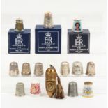 Fourteen Royal commemorative thimbles comprising a silver Spa with raised letter border 'GR', a