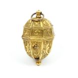 An 18th Century gilded metal thimble case of octagonal egg form hinged cover with circular