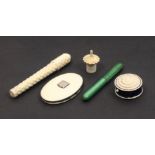 Five 19th Century ivory sewing tools comprising a flowerhead carved disc form pin cushion, 3.4cm, an