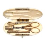 A French oval ivory etui, gilt metal fittings, circa 1890, the case with engraved monogram 'SIC',