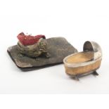 A silver novelty pin cushion and a pen wiper, the pin cushion in the form of a rocking cradle,