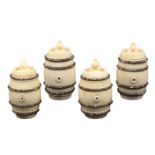 A rare set of four early 19th Century ivory cotton barrels each with four bands of cut steel pins,