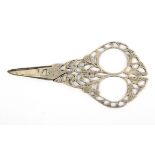 A pair of 19th Century silver scissors probably Italian, the short tapering blades to engraved and