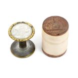 Two scarce cotton reels comprising a wooden example with die stamped ends, one end with a lady