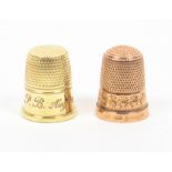 Two gold thimbles comprising a 9ct gold example by Charles Horner, Chester, 1915, and a modern 9ct