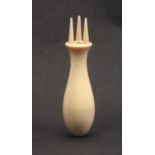 A 19th Century ivory knitting Nancy, the baluster form handle below three spikes, 9cm