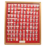 Buttons - a framed display of 100 fire service buttons 1947-1994, mostly white metal, frame 52 x