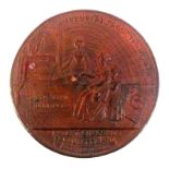 A rare wooden die stamped reel end or advertising tablet titled 'Industry Promotes Wealth' depicting