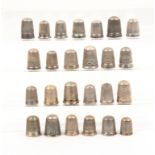 Twenty four British silver thimbles of plain design, 20th Century (24)