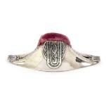 A silver novelty pin cushion in the form of a bicorn hat, plum velvet infill, some marks rubbed,