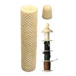 An early 19th Century ivory sewing companion the cylinder form case of stacked brick design, screw