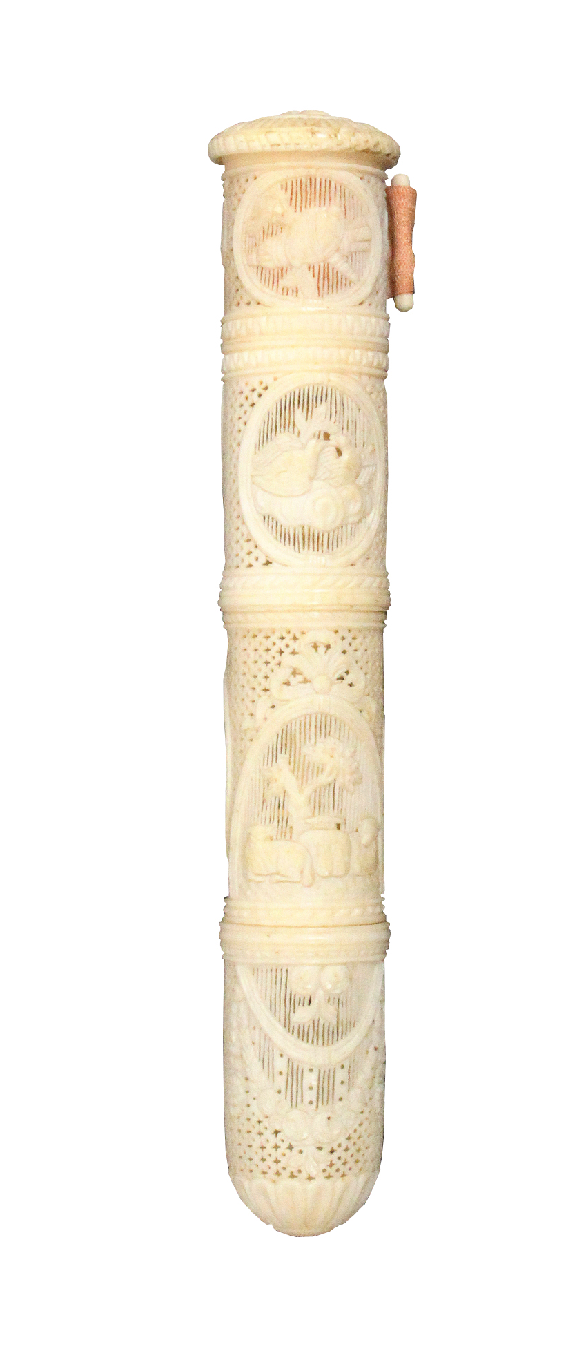 A fine early 19th Century French ivory sewing companion of cylinder form, the whole elaborately