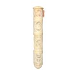 A fine early 19th Century French ivory sewing companion of cylinder form, the whole elaborately