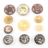 Buttons - eleven 19th Century buttons, comprising four horn examples comprising a pair inlaid with