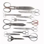 A collection of scissors comprising an early pair stamped 'Gambia', 22.5cm a tailors pair 30cm,