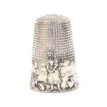 A French silver fable thimble 'The broken pitcher', stamped 'France'