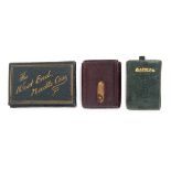 Three needle packet containers comprising an unusual leather example with sliding mechanism,