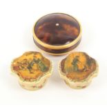 A tortoiseshell box and two 19th Century painted ivory boxes, the first of circular form with gilt