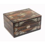 A mid Victorian coromandel wood rectangular sewing box the front and lid inlaid with panels of cut