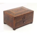 A Georgian burr yew wood rectangular sewing box, crossbanded and edged in boxwood, the front