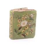 A fine Georgian needlework sewing companion in the form of a book in green silk, the covers and