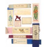 Bristol card work, comprising an inscribed stamp purse, 6.2cm, an alphabet sampler, 9.2cm, and eight