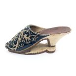 A rare 17th century slap soled mule or vamp in blue velvet with silver wire floral scroll