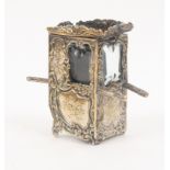 A pin cushion and thimble holder in silver plate modelled as a sedan chair, hinged cover over