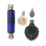 Four 19th glass scent bottles comprising a blue glass example of octagonal section, hinged silver