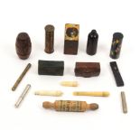 A collection of needles cases and containers comprising two leather book form examples titled '