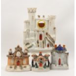 Four Staffordshire pottery cottages and castles including a castle form example incorporating a