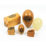 Mauchline ware - sewing - five pieces, comprising an unusual large egg containing an alabaster