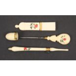 A good set of floral painted French ivory sewing tools, circa. 1830, comprising a quiver form needle